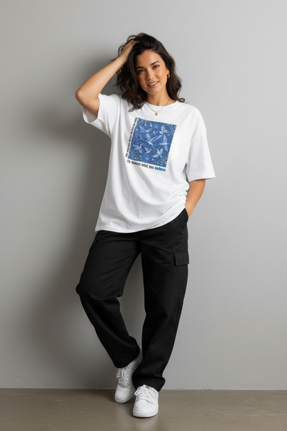 Fly Toward What You Believe white tee - leaning wall